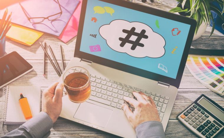 A laptop showing a hashtag symbol on its screen