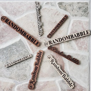 A number of nameplates on a stone floor