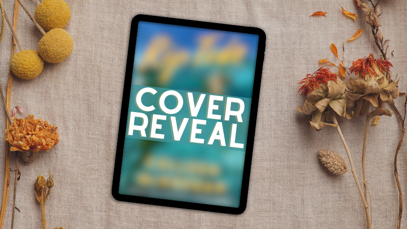 A flatlay of dried orange and yellow flowers on burlap, surrounding a tablet showing the text 'Cover Reveal' over a blurred book cover