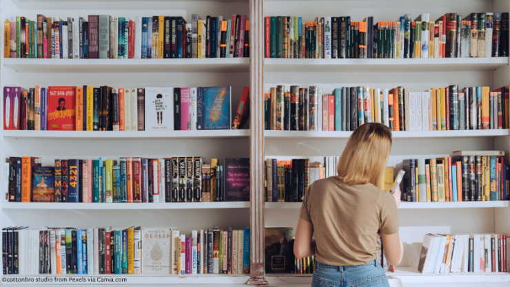 A woman browsing bookshelves