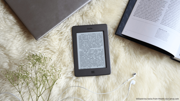 An e-reader on a white carpet