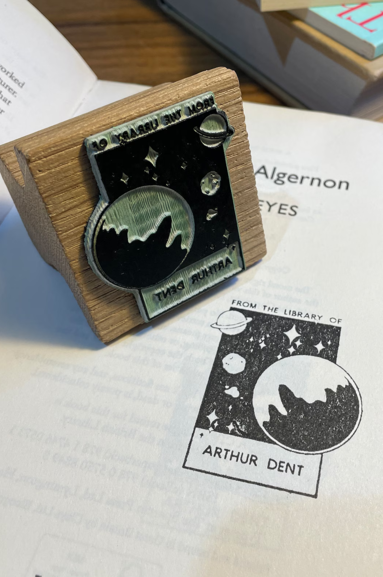 An ex libris stamp showing the universe