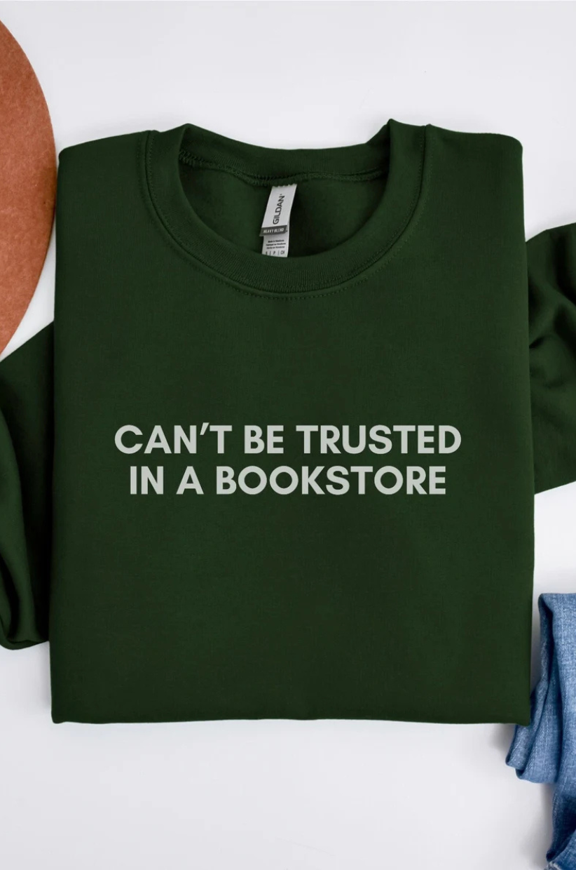 Sweatshirt that reads 'Can't be trusted in a bookstore'