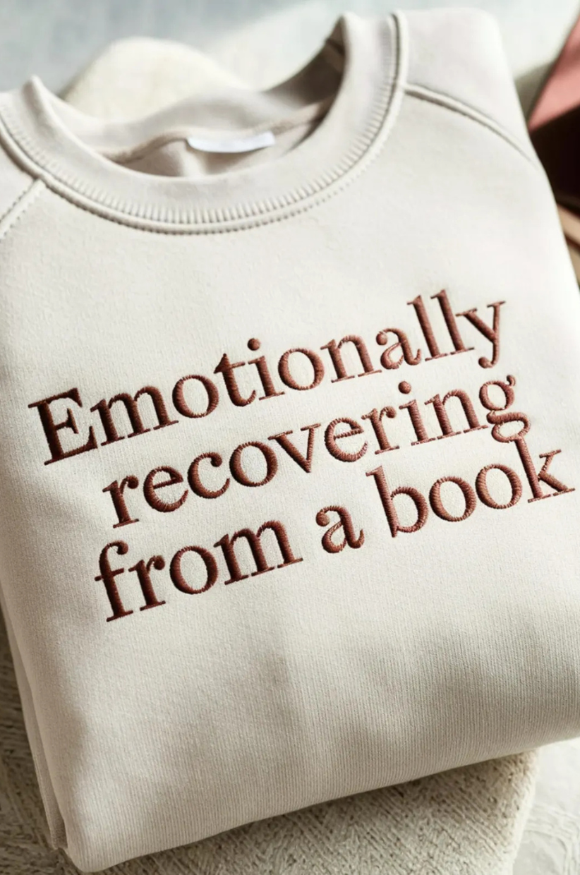 Sweatshirt that reads 'Emotionally recovering from a book'